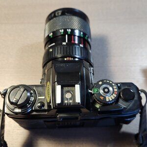 Minolta X-700 w Winder 1. Paired with Panagor 35-100mm F 3.5 and Promaster flash